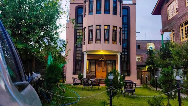 The Shelter Heritage boutique hotel in Srinagar, Kashmir, featuring a welcoming exterior and traditional hospitality.