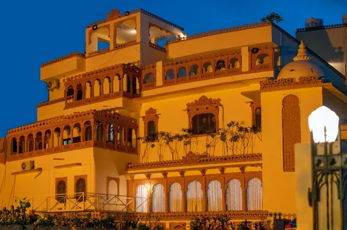 The Lavitra Heritage Hotel in Udaipur featuring traditional architecture near Fateh Sagar Lake.